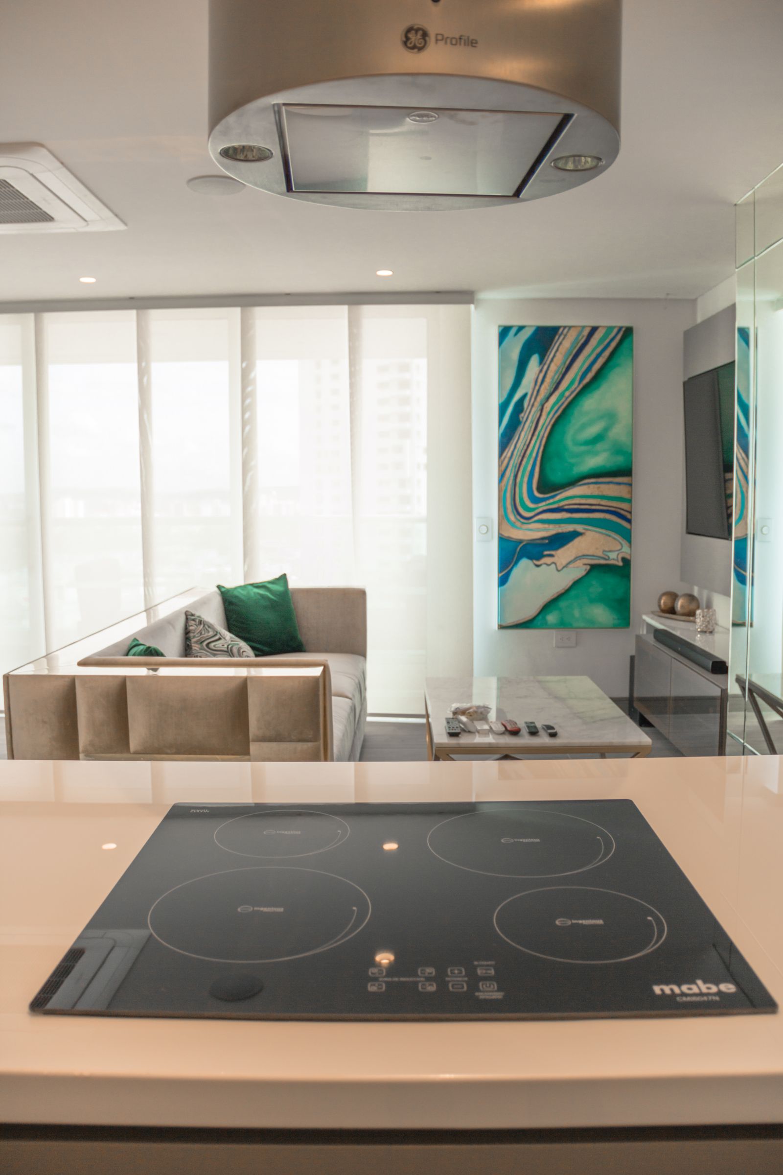 A glass-ceramic cooktop in a contemporary kitchen — professional Miele cooktop repair