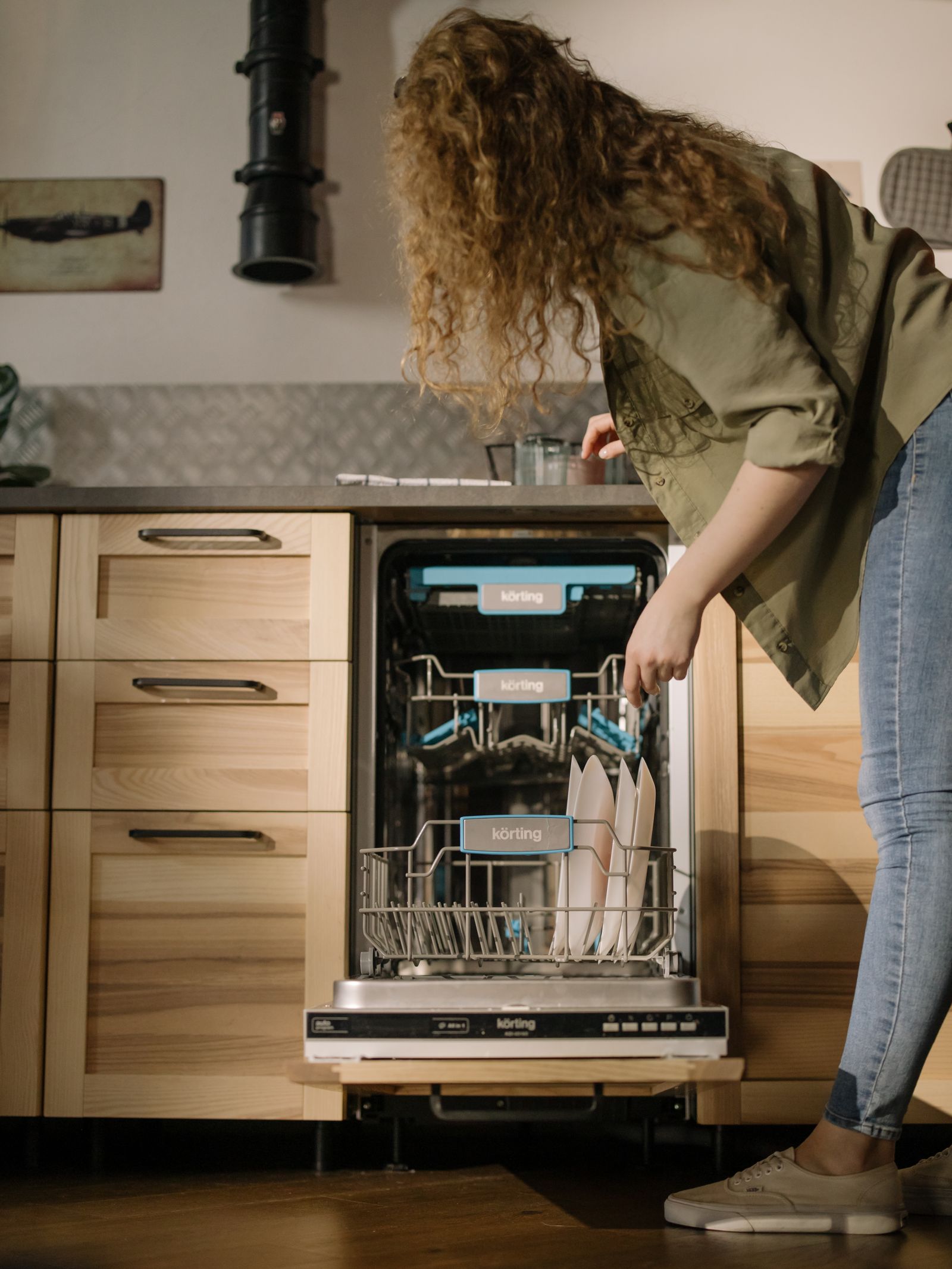 The detergent dispenser inside a dishwasher door — professional Miele dishwasher repair