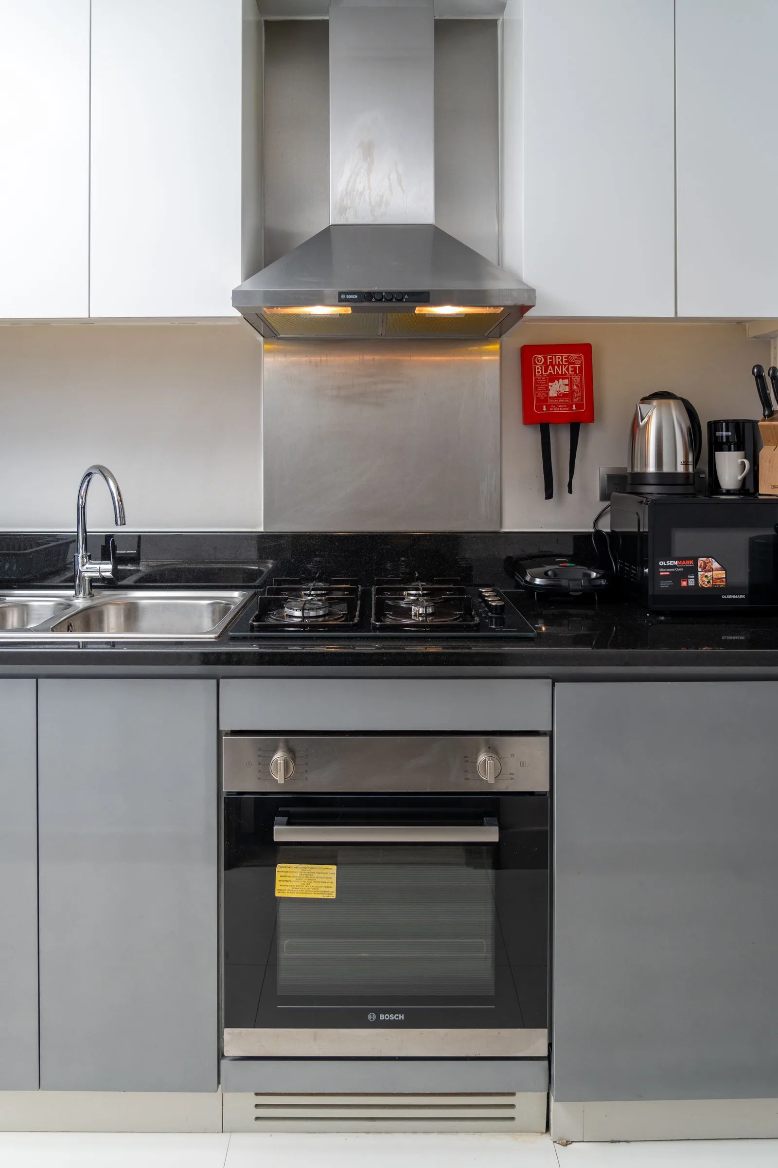 A pro-style range with blue-flame burners — professional Miele range repair